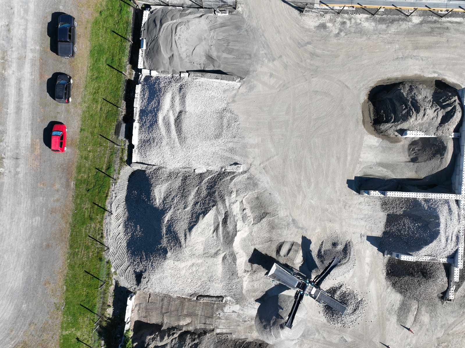 Stockpile bays and a screen at ACM's Hastings yard from above
